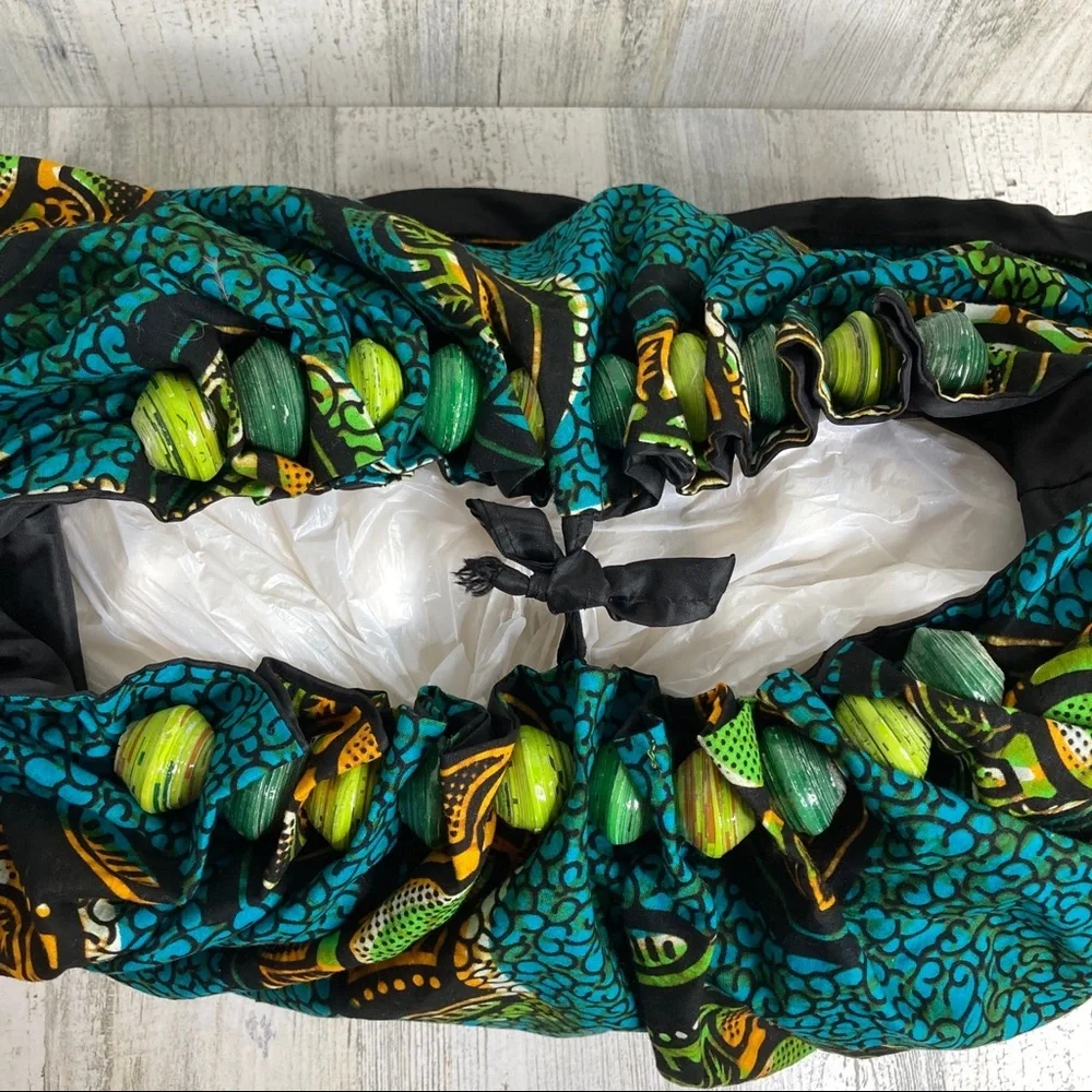 handmade travel hobo bag with paper bead design